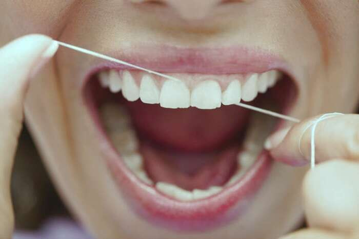 نکات مهم استفاده از نخ دندان اهمیت استفاده از نخ دندان