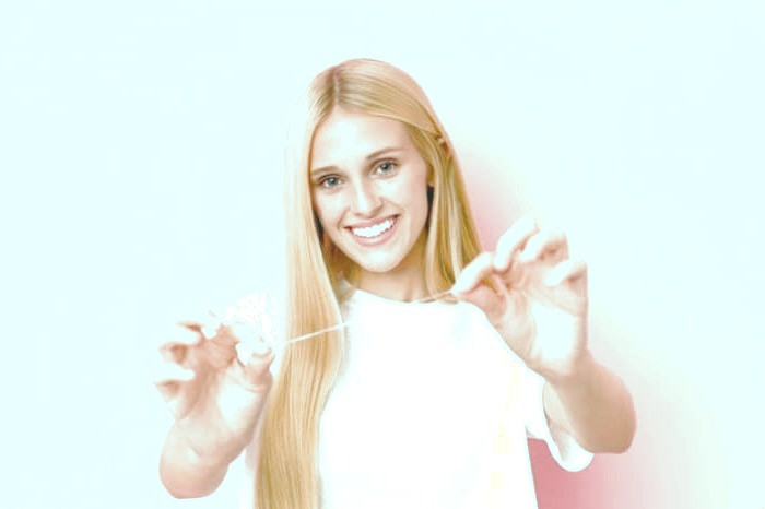 طریقه نخ دندان کشیدن