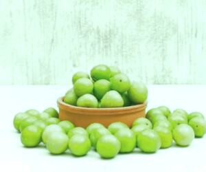 گوجه سبز در معده: خطرات و پیامدهای مصرف بیش از حد